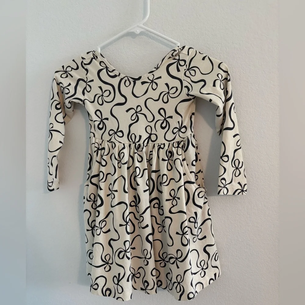 Hanna Andersson Peek a Bow Long Sleeve Skater Dress with Pockets